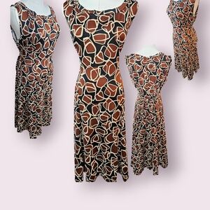 Elegant Geometric Midi Dress in Brown and Black